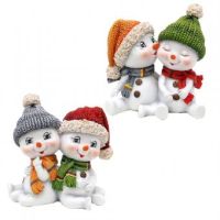 Schneekinderpaar mit Mütze und Schal
